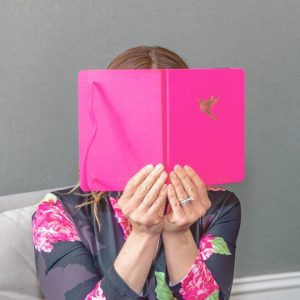 Chloe Leibowitz holding pink bullet journal